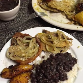 Chicken Time Cuban and Puertorican Restaurant - This is the platter.. It comes with pork chops, plantains, tamales, rice and beans, etc. - Cuban Near Me - Belleview, Florida Chicken Time Cuban and Puertorican Restaurant - This is the platter.. It comes with pork chops, plantains, tamales, rice and beans, etc. - Cuban Near Me - Belleview, Florida