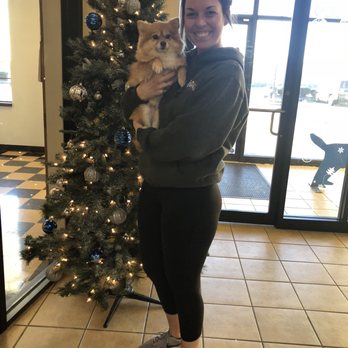 Pet Palace - Columbus Airport - The manager Lindsey holding my baby while she decorated the Christmas tree! - Pet Groomers Near Me - Columbus, Ohio Pet Palace - Columbus Airport - The manager Lindsey holding my baby while she decorated the Christmas tree! - Pet Groomers Near Me - Columbus, Ohio
