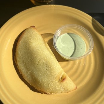 Bartolo Cigars & Wine - Arepa style empanada (shredded meat w/ cilantro lime crema) - Cigar Bars Near Me - Delray Beach, Florida