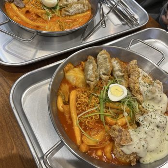 Dduk Dabang - Left: Beef Brisket Rosé Tteokbokki Right: Cheese Chicken Ramyum Tteokbokki - Korean Near Me - San Francisco, California Dduk Dabang - Left: Beef Brisket Rosé Tteokbokki Right: Cheese Chicken Ramyum Tteokbokki - Korean Near Me - San Francisco, California
