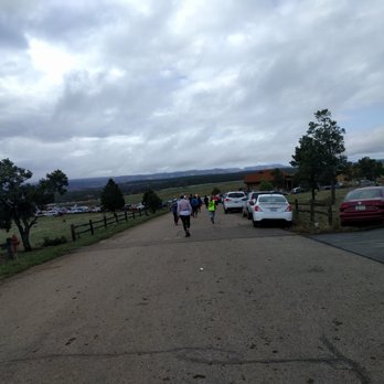 Zion Half Marathon - Parked cars along the route all the way to the horizon. Not a pretty run, nor a reasonable walk to- and from- the shuttle lot. - Races & Competitions Near Me