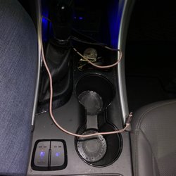 Rick's Car Wash & Fastlube - Dirty console and cup holders