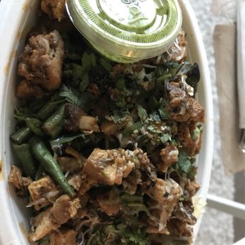 Bolay - SO GOOD. Basmati rice, green beans, lemon chicken, Parmesan, herb mix. IG: LunchwithLaur - New American Near Me - Boca Raton, Florida