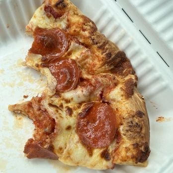 The Livingston County Pizza Co - Quick to-go slice, half eaten before I thought to take a picture. - Pizza Near Me - Avon, New York The Livingston County Pizza Co - Quick to-go slice, half eaten before I thought to take a picture. - Pizza Near Me - Avon, New York