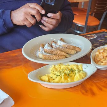 Culturistic Kitchen - man using his cell phone - Breakfast & Brunch Near Me - McDonough, Georgia Culturistic Kitchen - man using his cell phone - Breakfast & Brunch Near Me - McDonough, Georgia