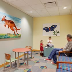 Uhrich Design - CHO Walnut Creek Waiting room with pediatric furniture and colorful artwork in a space remodel.