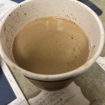 Starbucks - a cup of coffee on a table - Coffee & Tea Near Me - Houston, Texas Starbucks - a cup of coffee on a table - Coffee & Tea Near Me - Houston, Texas