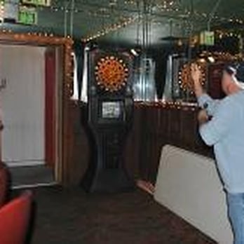 Jack's Pour House - a woman playing a game of darts - New American Near Me - Grand Prairie, Texas Jack's Pour House - a woman playing a game of darts - New American Near Me - Grand Prairie, Texas