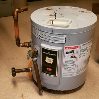 Aquatec Plumbing - Old electric water heater (before service photo) - Plumbing Near Me Aquatec Plumbing - Old electric water heater (before service photo) - Plumbing Near Me