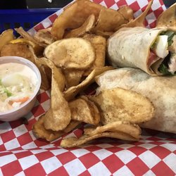 The Beach Tiki Bar & Grill - Calypso chicken wrap with homemade chips and coke slaw