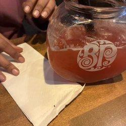 Boston Pizza - Fishbowl drink with dead bug found. Placed on the napkin