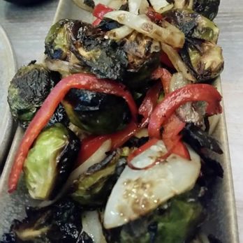 Moku Kitchen - Grilled Brussels sprouts with other vegetables. - Cocktail Bars Near Me - Honolulu, Hawaii