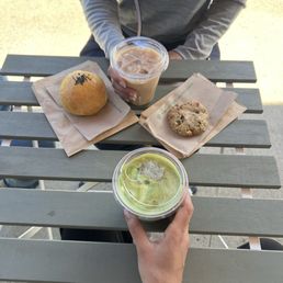 Matcha latte drink, chai tea latte, rainbow milk cookie, and taro cream bun Matcha latte drink, chai tea latte, rainbow milk cookie, and taro cream bun