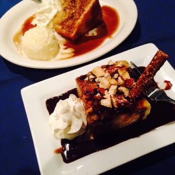 Blue Bistro & Catering - Cinnamon apple fireball cake served with ice cream and the salted caramel and chocolate pretzel bread pudding. Amazing!!! - New American Near Me - Westminster, Maryland Blue Bistro & Catering - Cinnamon apple fireball cake served with ice cream and the salted caramel and chocolate pretzel bread pudding. Amazing!!! - New American Near Me - Westminster, Maryland