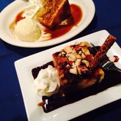 Blue Bistro & Catering - Cinnamon apple fireball cake served with ice cream and the salted caramel and chocolate pretzel bread pudding. Amazing!!!