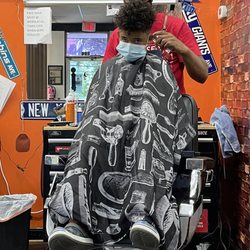 Moon's Barber Shop - My son getting a hair cut.