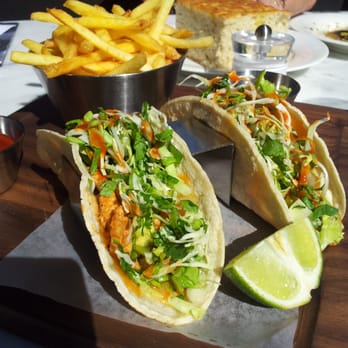 Earls Kitchen + Bar - Chicken tacos with fries - Canadian (New) Near Me - Vancouver, British Columbia Earls Kitchen + Bar - Chicken tacos with fries - Canadian (New) Near Me - Vancouver, British Columbia