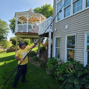 Paneless Window Cleaning - Our waterfed pole in action - Window Washing Near Me Paneless Window Cleaning - Our waterfed pole in action - Window Washing Near Me