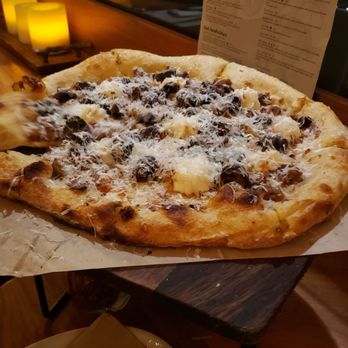 The Goat & Vine - Garlic confit pizza with house made sausage add cremini mushroom, local hot honey - Pizza Near Me - Temecula, California