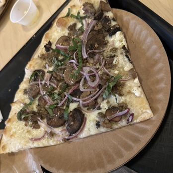 Pizza Af - a slice of pizza on a paper plate - Food Trucks Near Me - Louisville, Kentucky Pizza Af - a slice of pizza on a paper plate - Food Trucks Near Me - Louisville, Kentucky