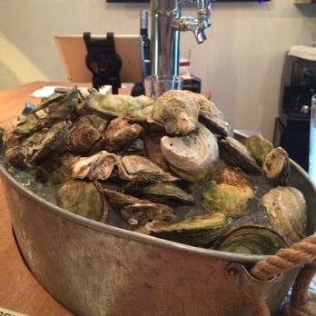 Studio East Asian Gastropub - Oysters du jour- with pretty greenish shells! - Gastropubs Near Me - Halifax, Nova Scotia Studio East Asian Gastropub - Oysters du jour- with pretty greenish shells! - Gastropubs Near Me - Halifax, Nova Scotia