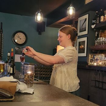 1915 Wine Cellar - With charm and skill, Sophie keeps patrons happy at the bar. - Wine Bars Near Me - Poughkeepsie, New York
