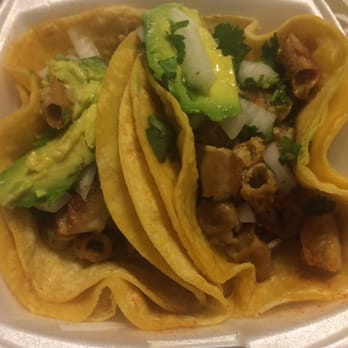 El Pilar - Two tacos! with their amazing hot sauce on the side and real slices of Avocado - Mexican Near Me - Riviera Beach, Maryland