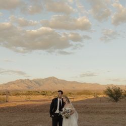 Agua Linda Farm - Bride and groom with mountain at Agua Linda Farm wedding venue near Tucson. Rylin Noelle photography