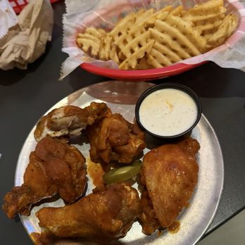 Pluckers Wing Bar - Landmark - 5 wing combo with waffle fries spicy ranch flavor - Chicken Wings Near Me - San Antonio, Texas Pluckers Wing Bar - Landmark - 5 wing combo with waffle fries spicy ranch flavor - Chicken Wings Near Me - San Antonio, Texas