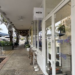 Exterior outside entrance of Honey Veil - Outside on the little strip - South Miami, Florida Exterior outside entrance of Honey Veil - Outside on the little strip - South Miami, Florida