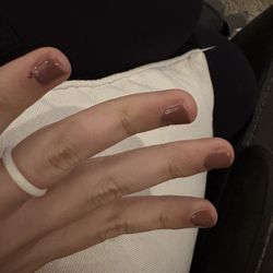 4 Seasons Nails & Spa - Got a service done there and she was very careless with the cuticles... also missing the side of my fingers and didn't clean at all.