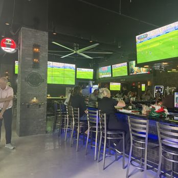 Back Bar - Numerous television to watch all different sporting events - Sports Bars Near Me - St. Petersburg, Florida