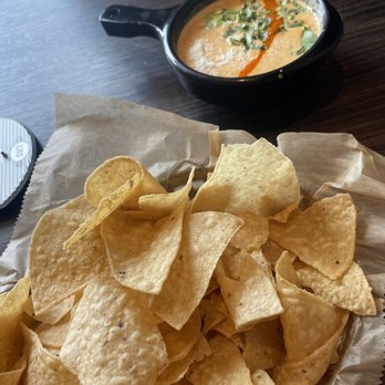 Torchy's Tacos - Green Chile Queso and chips - Tex-Mex Near Me - Glen Allen, Virginia Torchy's Tacos - Green Chile Queso and chips - Tex-Mex Near Me - Glen Allen, Virginia