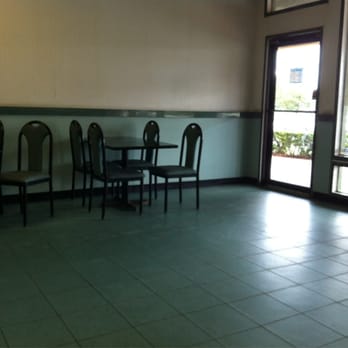 China Star - empty restaurant with tables and chairs - Chinese Near Me - Orange City, Florida China Star - empty restaurant with tables and chairs - Chinese Near Me - Orange City, Florida