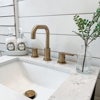 Jimenez Construction - a bathroom sink with a marble countertop - General Contractors Near Me - San Francisco, California