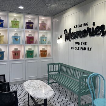 Main Street Creamery - Cute seating area with display of colorful ice cream churners. - Ice Cream & Frozen Yogurt Near Me - Sarasota, Florida