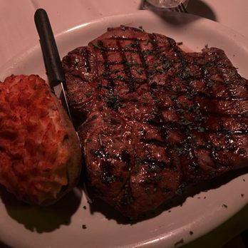 La Cave - 24oz Porterhouse/medium rare with double baked potato. - Steakhouses Near Me - Costa Mesa, California La Cave - 24oz Porterhouse/medium rare with double baked potato. - Steakhouses Near Me - Costa Mesa, California