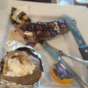 Sunset Grille - 10 oz NY Strip Steak - Sports Bars Near Me - Marco Island, Florida Sunset Grille - 10 oz NY Strip Steak - Sports Bars Near Me - Marco Island, Florida