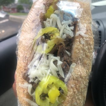 Mac's Liquor  - a sandwich wrapped in plastic - Beer, Wine & Spirits Near Me - Taylor, Michigan