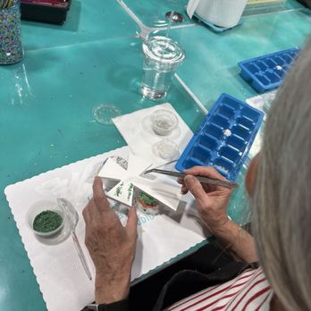 The Shard Yard Art Studio - Working hard on her cross piece - Art Classes Near Me - Webster, Texas