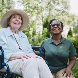 Home Instead - Home Instead client and their caregiver enjoying nature
