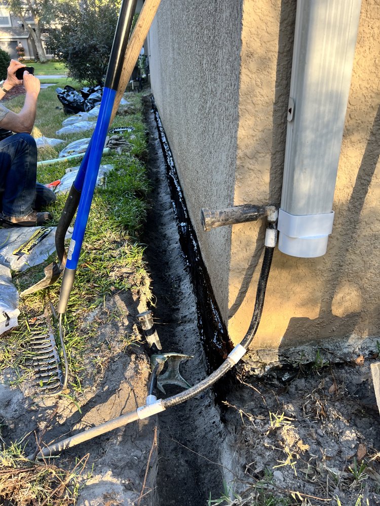 Slide of The French Drain Guys