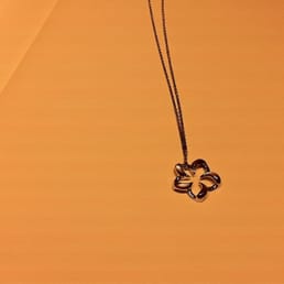 White Gold Floating Plumeria with Mother Of Pearl Inlay White Gold Floating Plumeria with Mother Of Pearl Inlay
