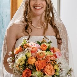 Leonhards Flower Shop - Gorgeous bouquet pinned together with wrapped leaves and pearls