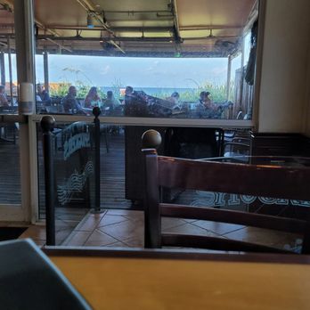 Shuckers - Overlooking the Atlantic... you can sit outside and eat, but in July... why? We ate inside! - Seafood Near Me - Jensen Beach, Florida