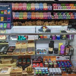 House of Smoke - Great selection of ashtrays, storage boxes, grinders, including Rubik's style cube, LED lights, keychains,and more.