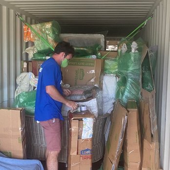 Wailea Movers and Storage - Christopher "repacking" the household goods on the container so the 2nd car could fit! - Movers Near Me - Kihei, Hawaii
