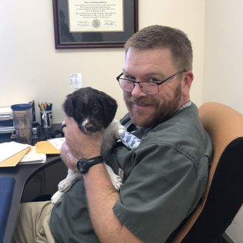 Raymore Veterinary Center - Dr. Shane Brookshire with one of our extra cute patients. - Veterinarians Near Me - Raymore, Missouri Raymore Veterinary Center - Dr. Shane Brookshire with one of our extra cute patients. - Veterinarians Near Me - Raymore, Missouri