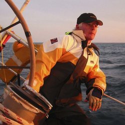 Griffin Sailing School - Captain Kris on Maxi Racer at Mackinac Race.