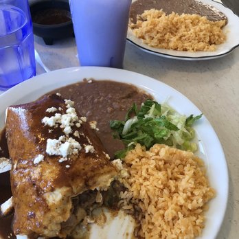 La Roca - Burrito plate (chicken burrito with queso fresco and a sweet mole sauce) and a side of home made horchata. - Mexican Near Me - Lincoln City, Oregon La Roca - Burrito plate (chicken burrito with queso fresco and a sweet mole sauce) and a side of home made horchata. - Mexican Near Me - Lincoln City, Oregon